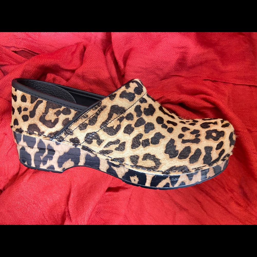 DANSKO leopard calf skin clogs.